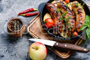 Grill pan with grilled sausages