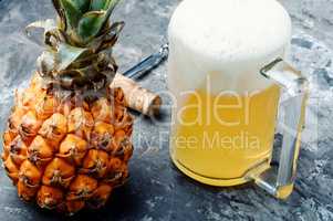 Glass with pineapple ale