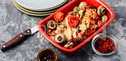 Delicious chicken in baking dish