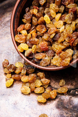 Ceramic bowl with raisins