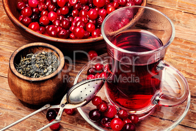 Aromatic hot tea on wooden table