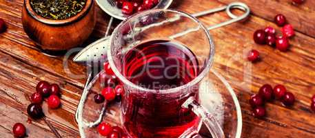Berry tea on wooden table