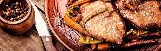 Beef steaks with vegetables