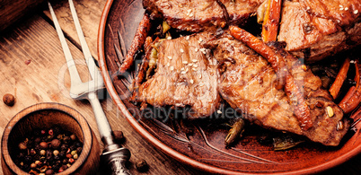 Beef steaks with vegetables