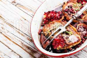 Grilled pork chop in pomegranate sauce