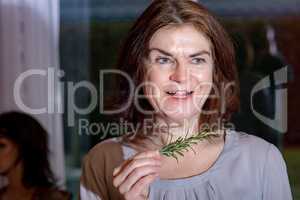 Woman with rosemary branch