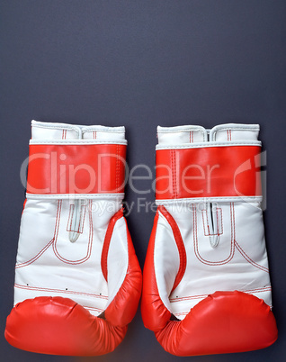 pair of red-white leather boxing gloves
