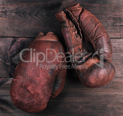 very old brown boxing gloves