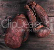 very old brown boxing gloves