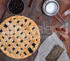 baked round black currant cake