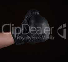 hand in black leather boxing glove