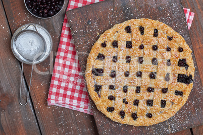 baked round black currant cake