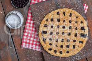 baked round black currant cake