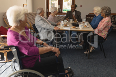 Group of senior friends having fun at nursing home