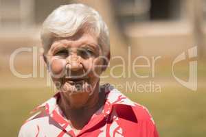 Close-up of senior woman looking at camera