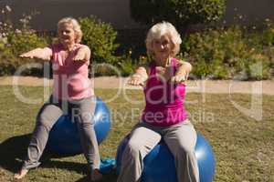 Senior women exercising on a exercise ball