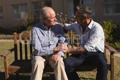 Senior men talking with each other in the park