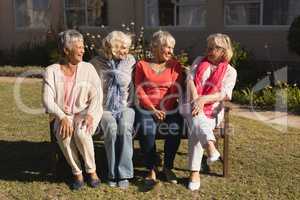 Group of senior women interacting with each other in the park