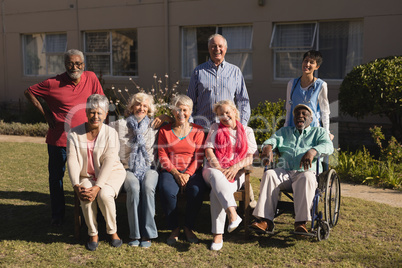 Senior people posing in the park