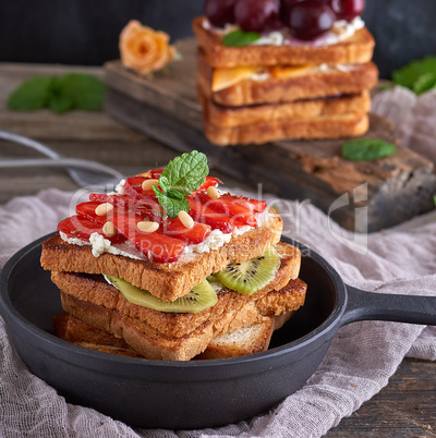 French toast from white bread with cottage cheese, strawberries,