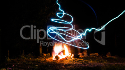 A campfire and light