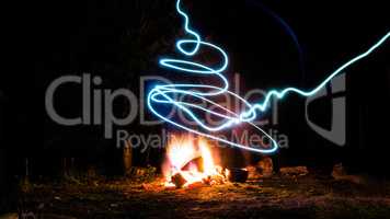 A campfire and light