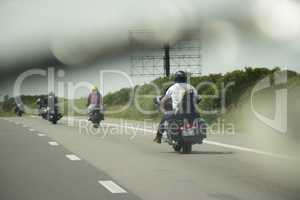 Bikers riding on the road