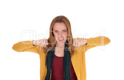Angry woman making her fists, looking frustrated