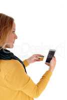 Woman buying with credit card over phone
