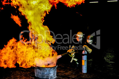 Firefighters training for fire fighting.