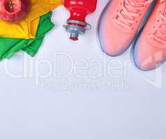 pink sports sneakers and green clothes