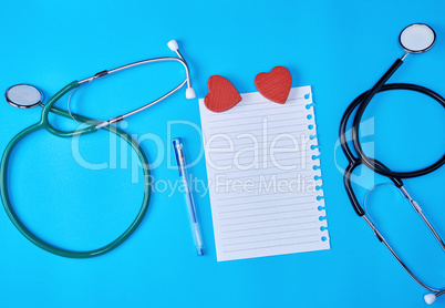 blank paper sheet  and medical stethoscope