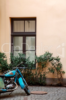 Motorcycle next window in Riga town.