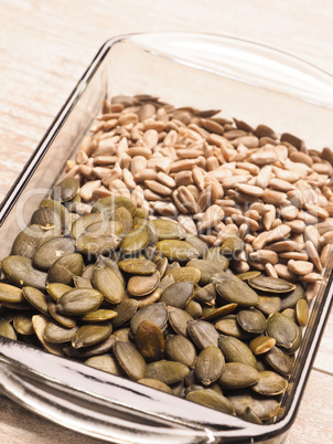 Organic pumpkin and sunflower seeds in a bowl