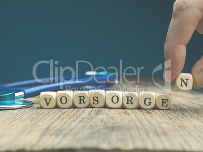 The German word prevent on wooden dices