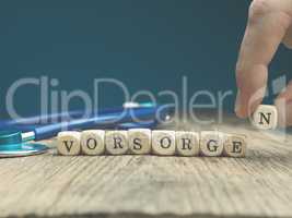 The German word prevent on wooden dices