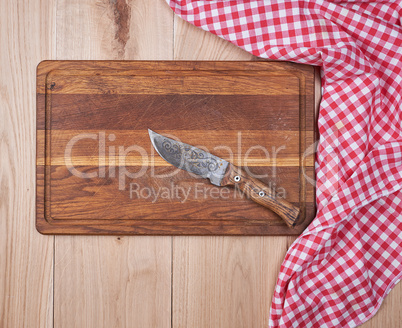 Empty old wooden kitchen cutting board