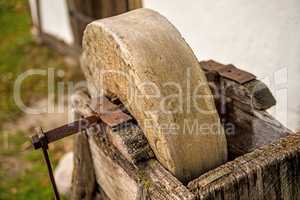 old rotary grindstone at a country house