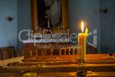 Burning candle at Koknese Evangelical Lutheran Church.