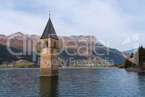 Church in the water at Lake Reschen in Tyrol in north Italy