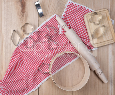 wooden kitchen items on a red towel