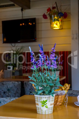 Decoration with flowers in cafe.