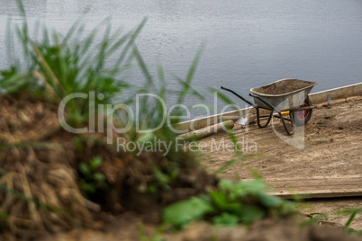 Wheelbarrow for construction in site building area.