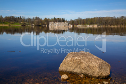 River landscape with big stones and ruins in Latvia.