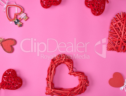 abstract background with red hearts on a pink background