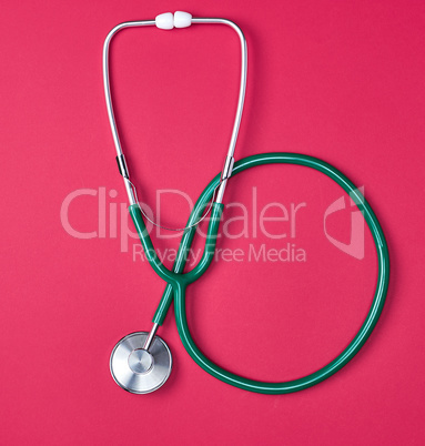 green medical stethoscope