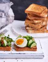 toasted square pieces of bread from white wheat flour with boile