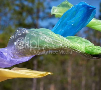 empty plastic garbage bags fly in nature