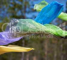 empty plastic garbage bags fly in nature