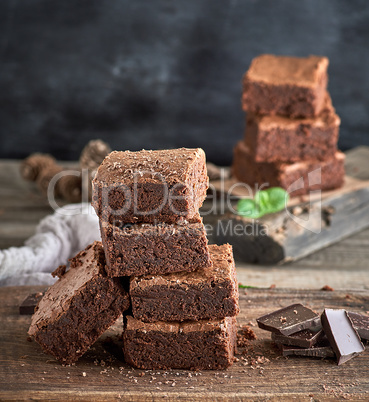 stack of square brownie cake pieces
